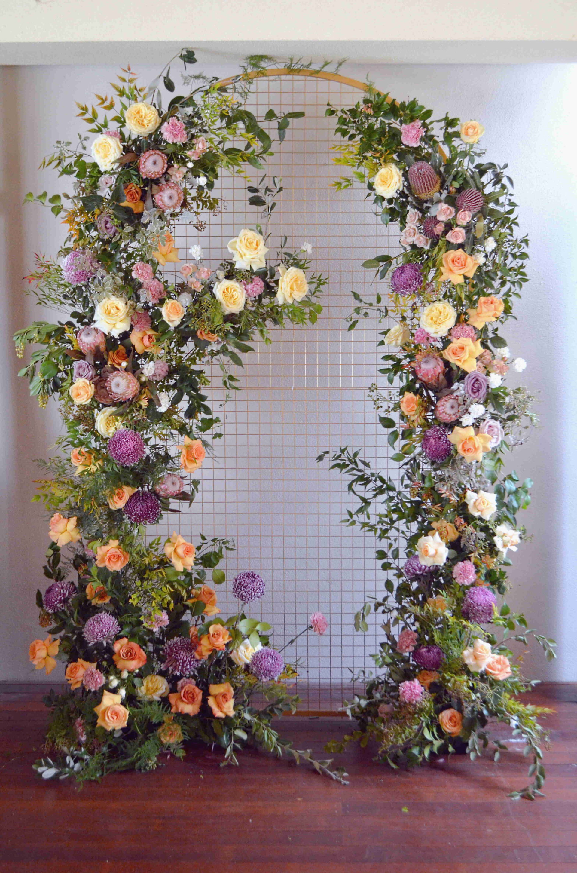 Perth Wedding Florist Backdrop. Peach and Pink Arbour flowers