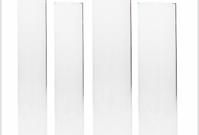 Glass cylinder sleeves for dinner candles.